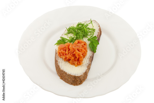 Sandwich with salmon on a plate