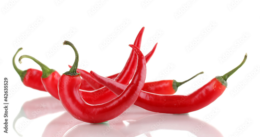 Red hot chili peppers isolated on white Red hot chili peppers isolated on white