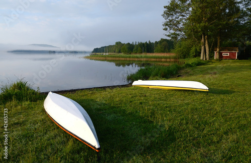 Kayaks in morning light © Piotr Wawrzyniuk