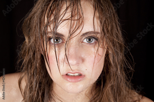 Obraz na plátně woman wet hair very serious