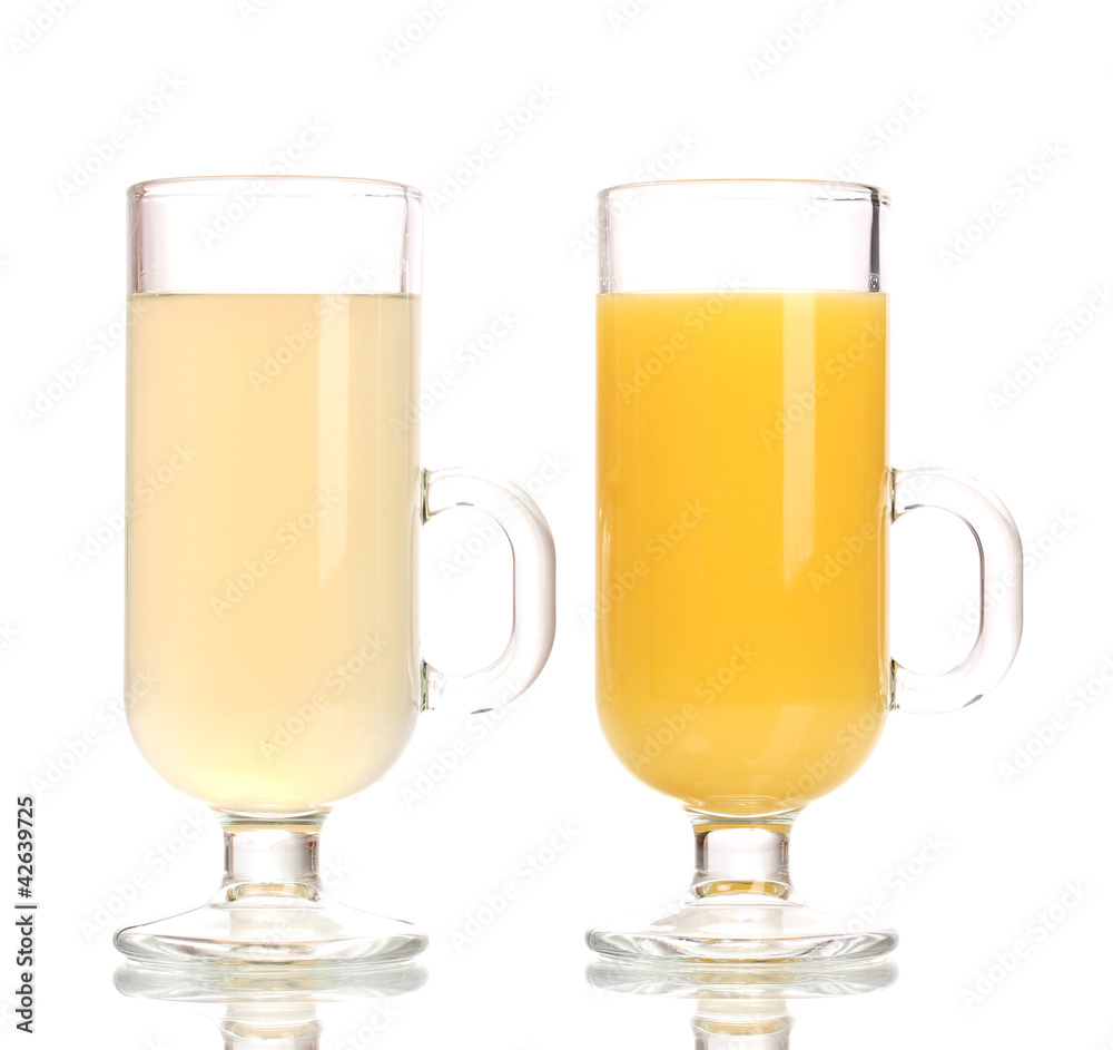 Tropical juices in glasses isolated on white Tropical juices in glasses isolated on white