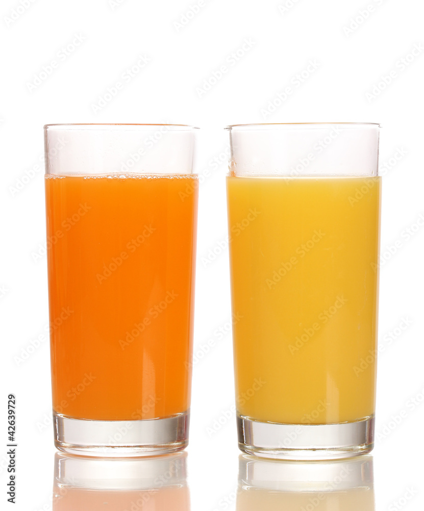 Tropical juices in glasses isolated on white Tropical juices in glasses isolated on white