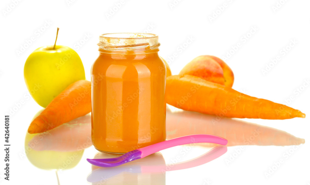 Jar with fruit and vegetables baby food and spoon isolated Jar with fruit and vegetables baby food and spoon isolated