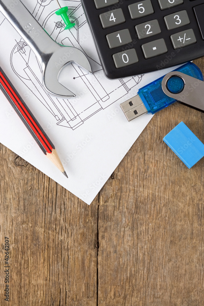 Fototapeta premium office supplies on drafting over wood