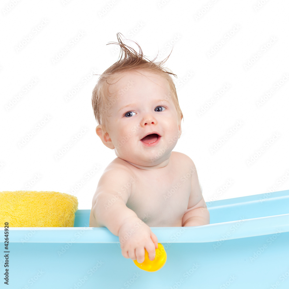adorable baby having bath in blue tub adorable baby having bath in blue tub