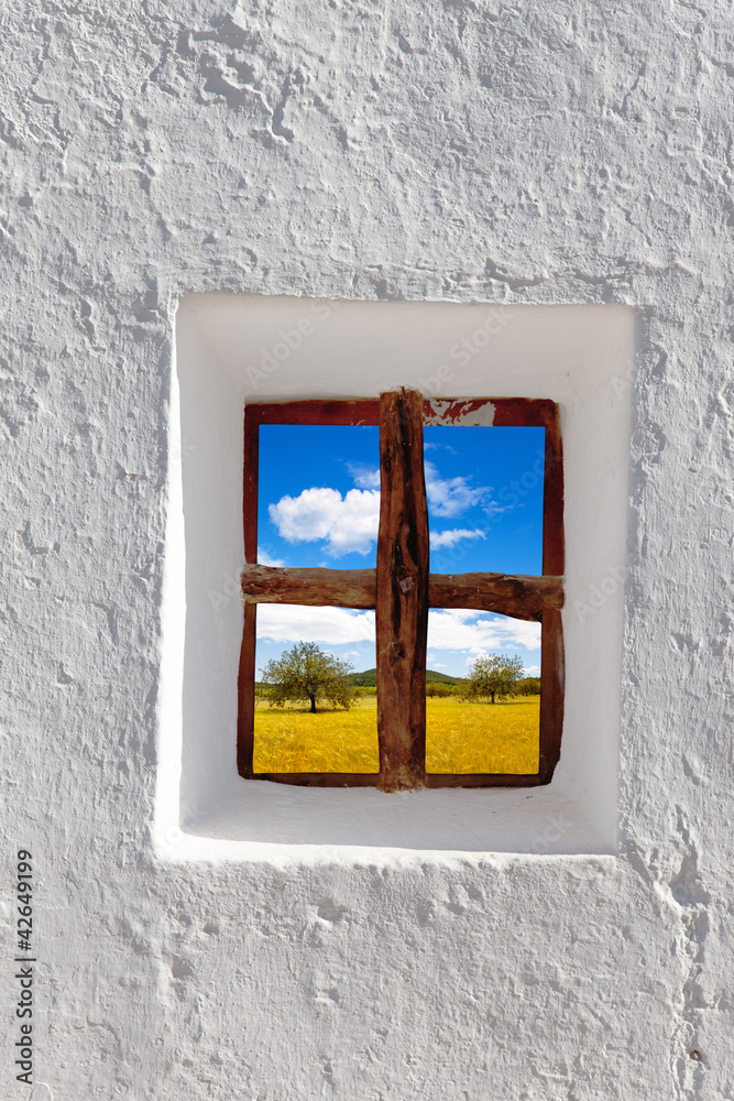 Balearic islands golden wheat field through window Balearic islands golden wheat field through window