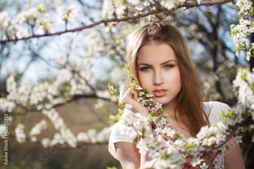 beautiful girl in the branches