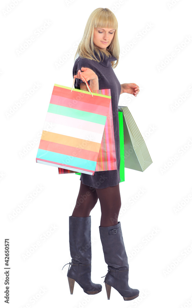 smiling young female with shopping bags smiling young female with shopping bags
