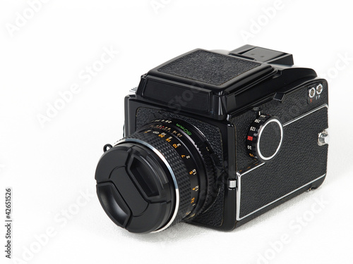 Plakat Medium format camera isolated on white background.