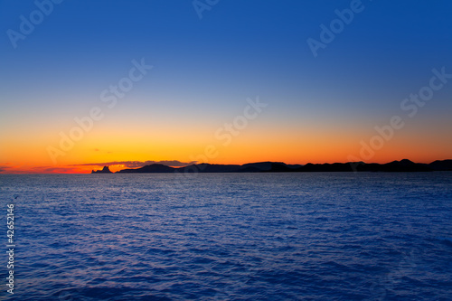Ibiza island sunset with Es Vedra in background