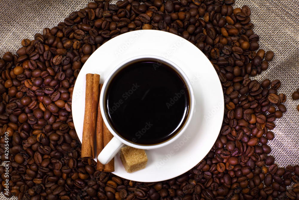 Coffee beans and white cup Coffee beans and white cup