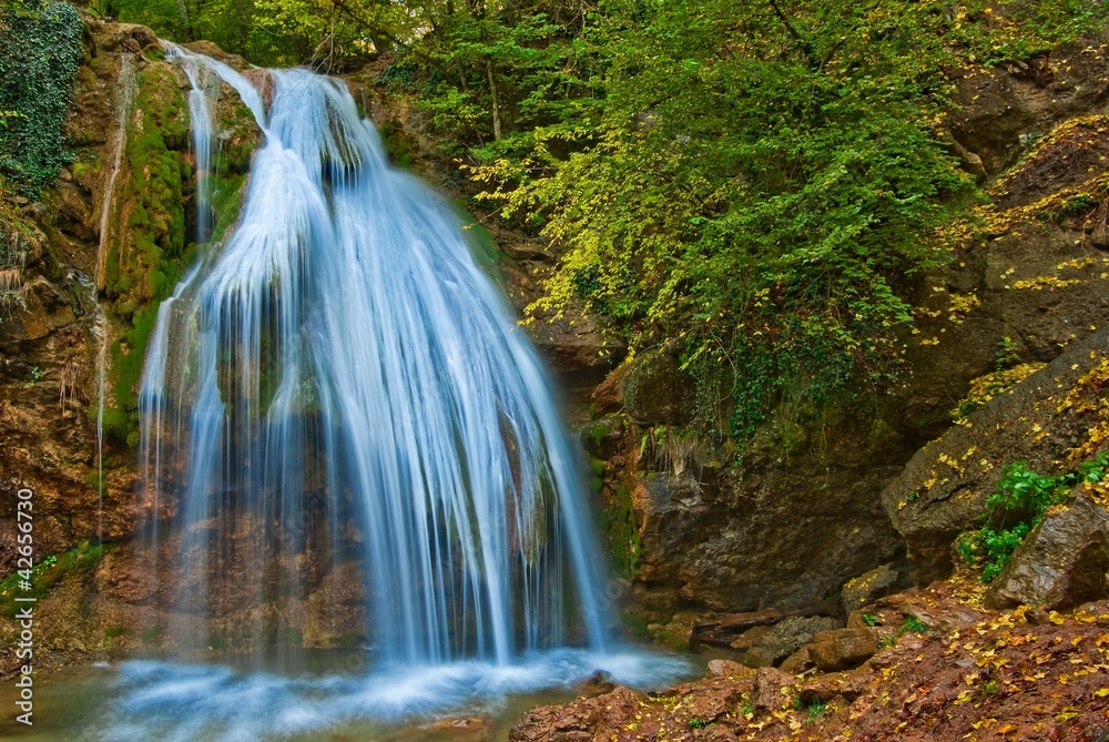 Obraz premium beautiful waterfall in a mountains