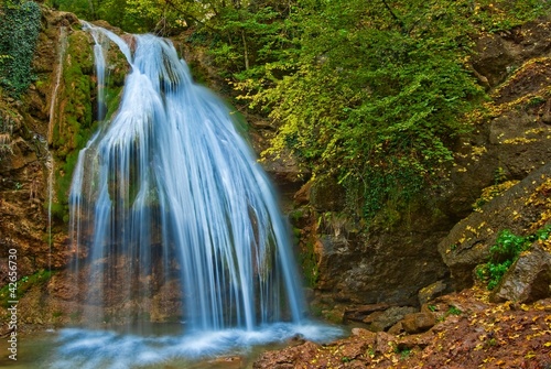 beautiful waterfall in a mountains