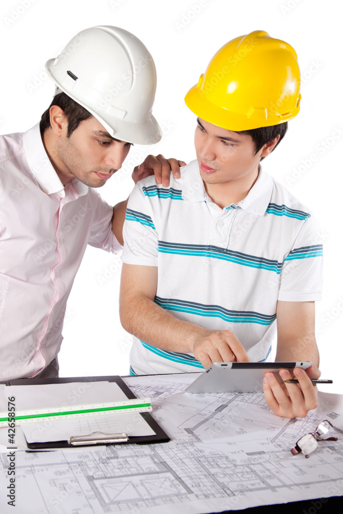 Two Architects Using Digital Tablet Two Architects Using Digital Tablet