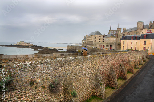 Tourists on the defensive wall of Saint Malo photo