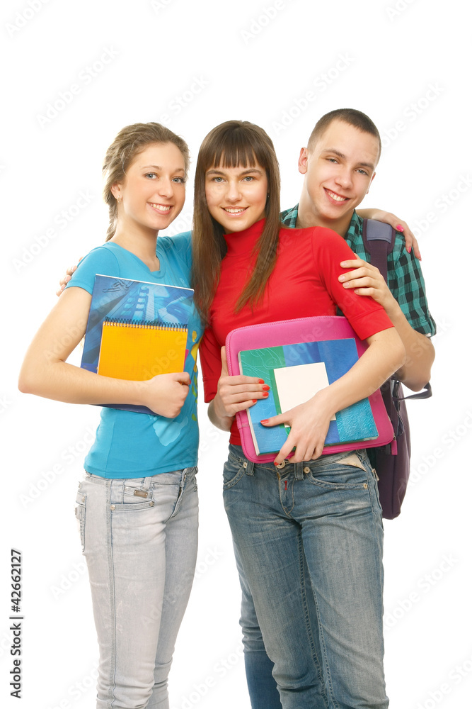 Group of young people standing holding notebooks Group of young people standing holding notebooks