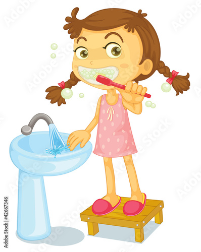 a girl brushing teeth