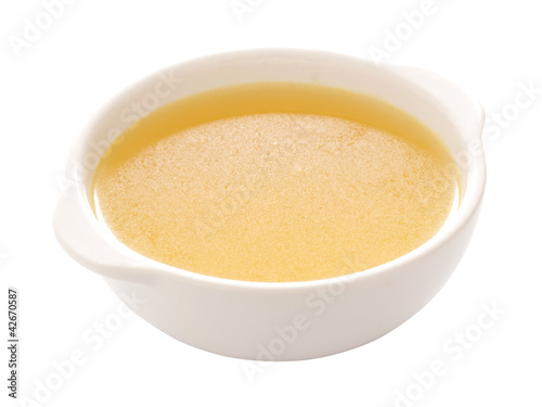 close up of a bowl of chicken broth photo