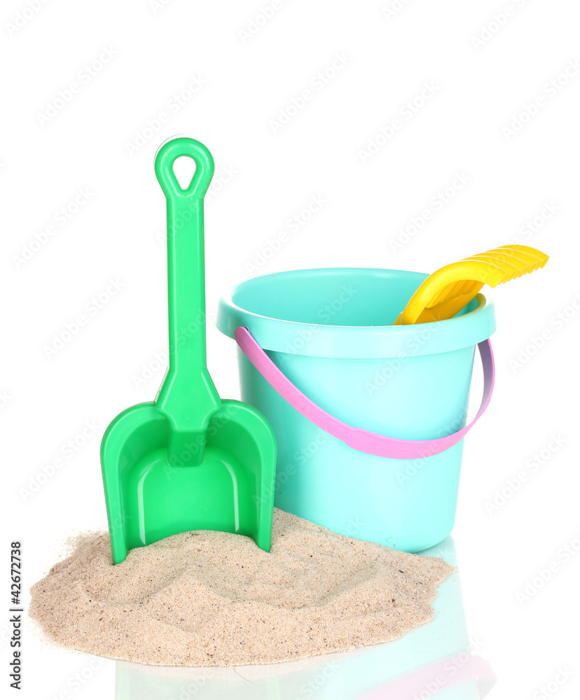 Children's beach toys and sand isolated on white Children's beach toys and sand isolated on white