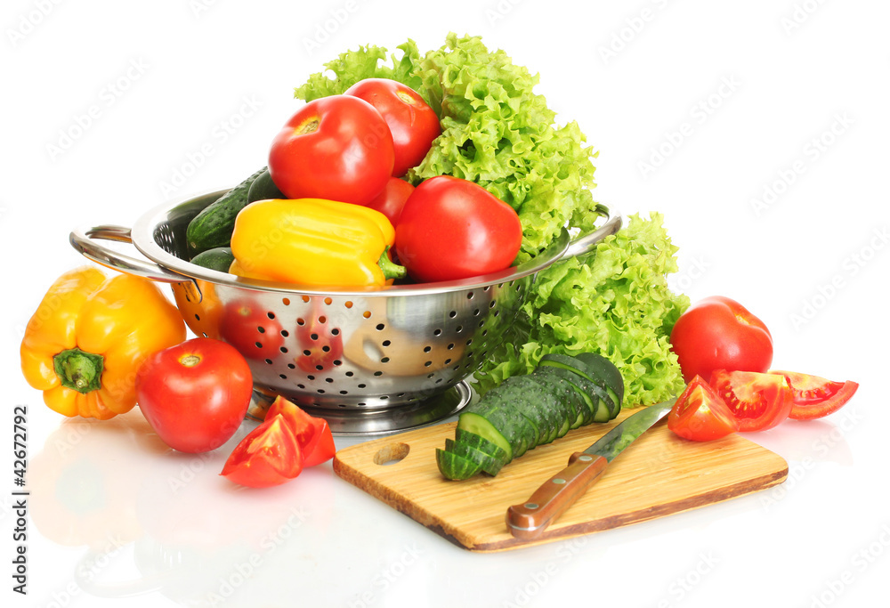 fresh vegetables and knife on cutting board isolated on white fresh vegetables and knife on cutting board isolated on white