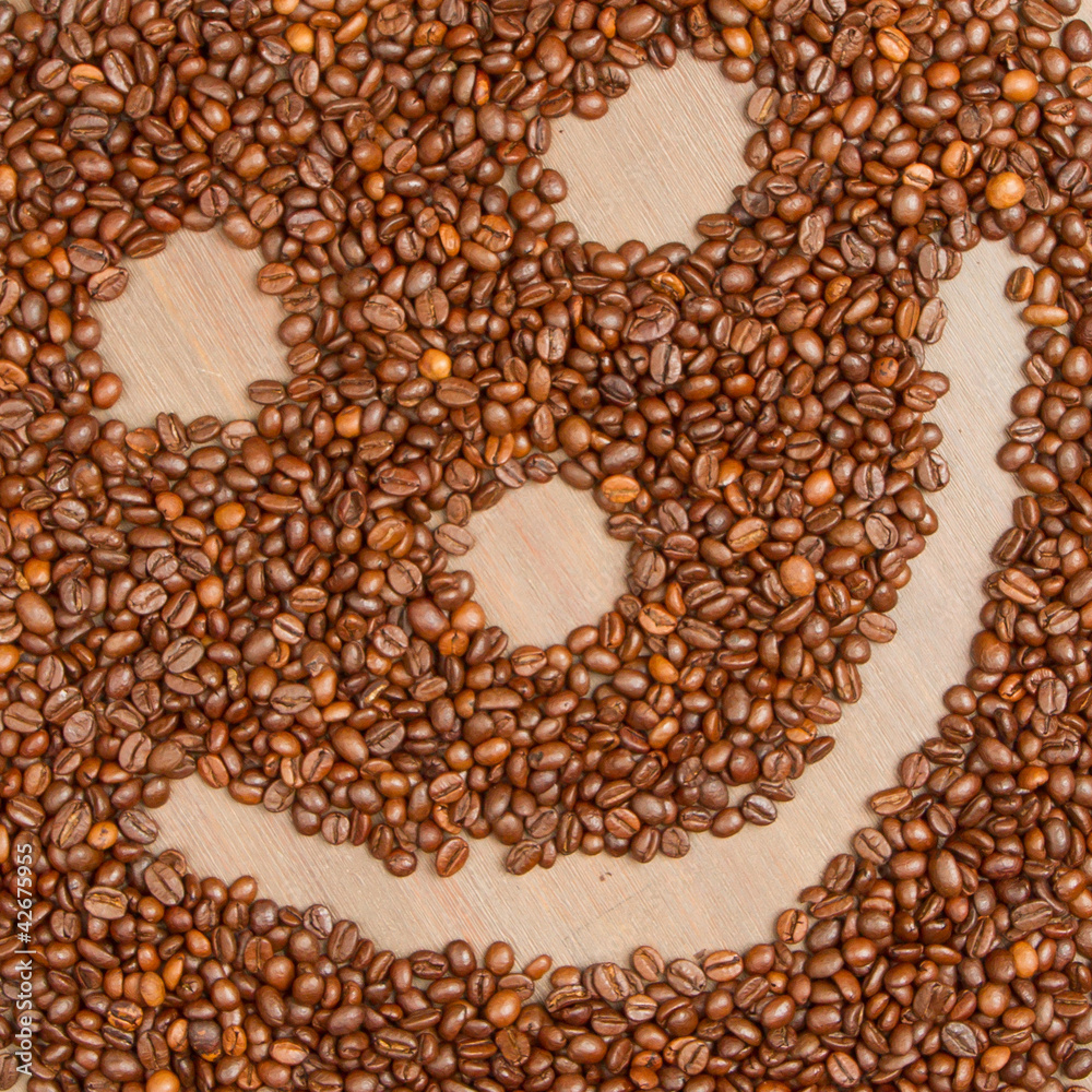 Coffee grains arranged in smiley