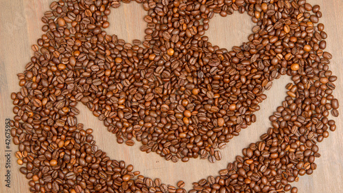 Coffee grains arranged in smiley
