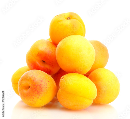 ripe apricots isolated on white