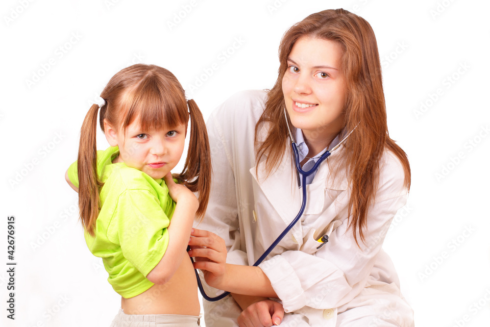 Medical doctor woman inspects beautiful little girl Medical doctor woman inspects beautiful little girl