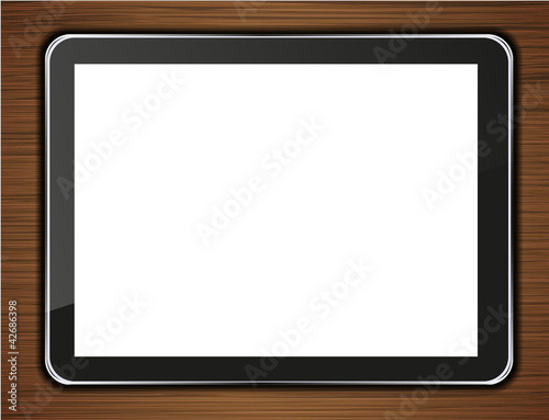 Vector computer tablet on wooden background. Eps 10