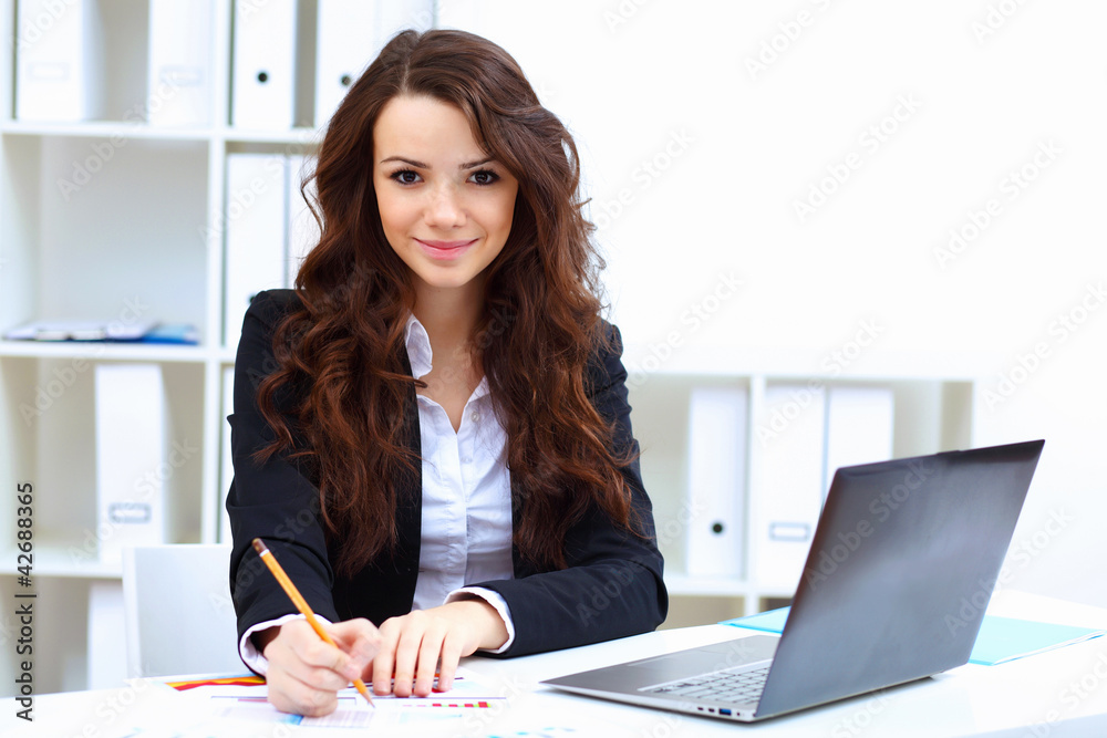Young busines woman with notebook Young busines woman with notebook