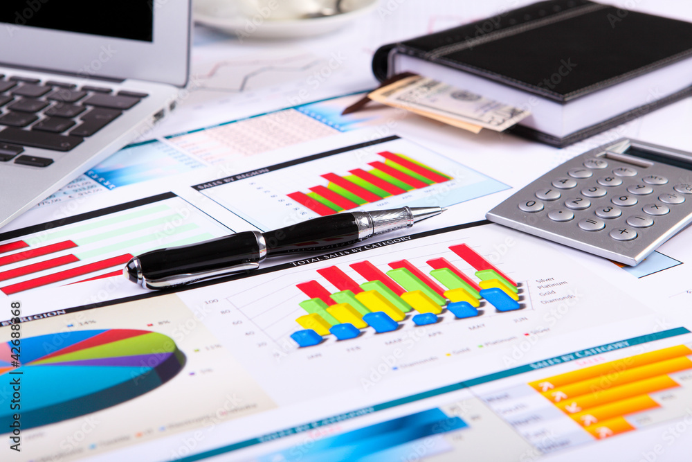 Financial papers on the table Financial papers on the table