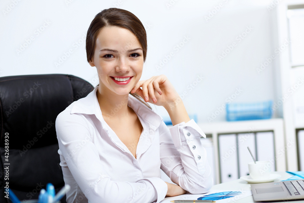 Young businesswoman in the office Young businesswoman in the office