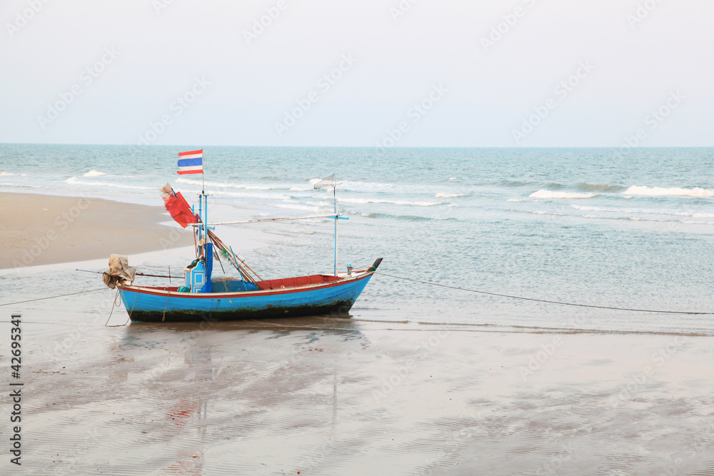 Thai native fishing boat on the beach