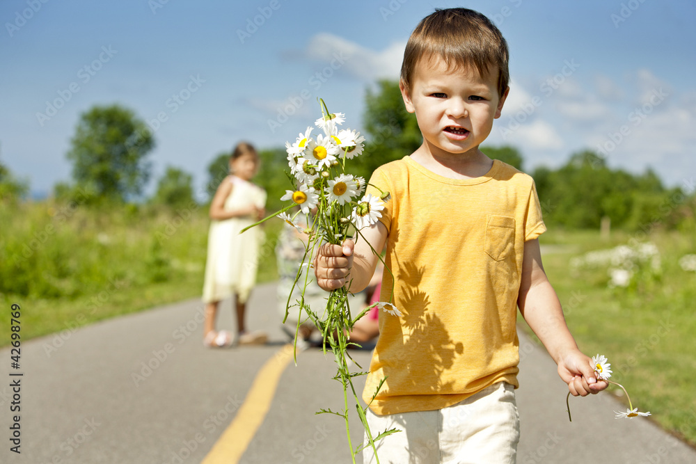 toddler smelling flower toddler smelling flower
