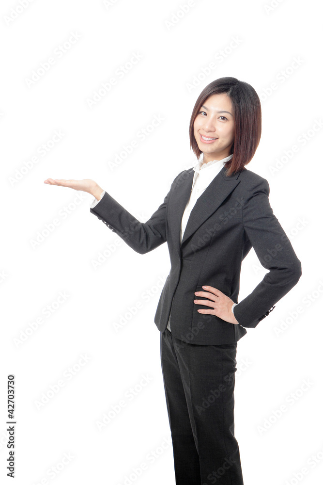 Business woman showing copy space by hand Business woman showing copy space by hand