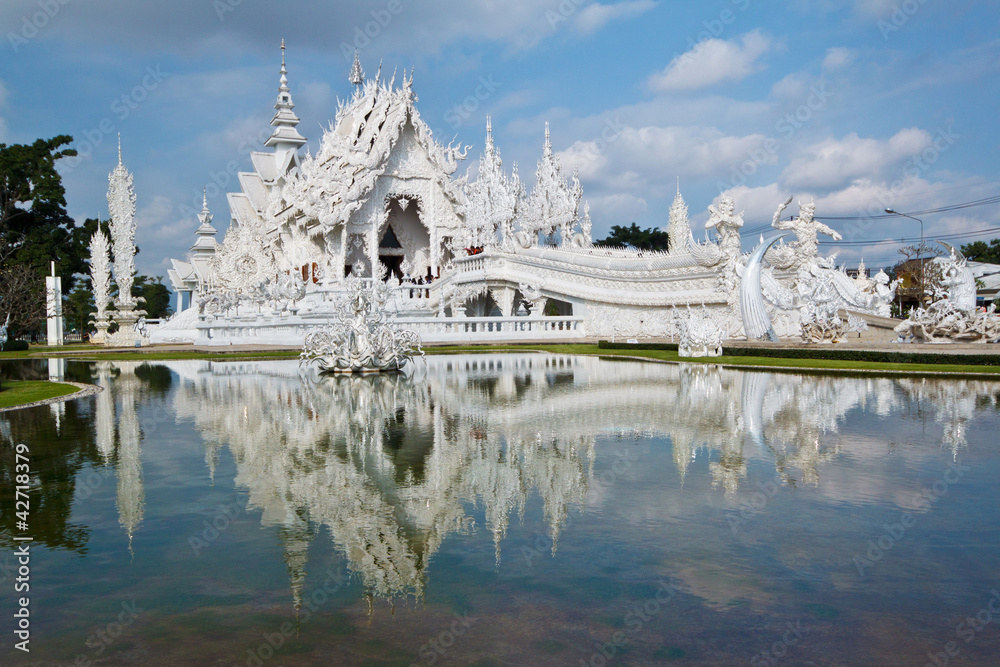 White church in Wat Rong Khun reflection, Thailand