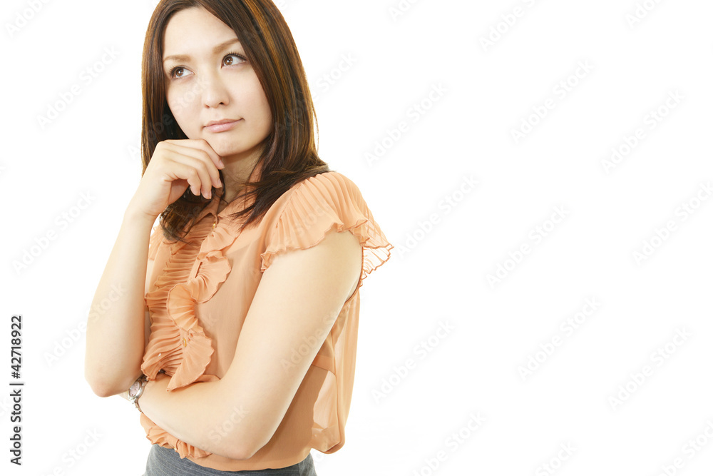 Fototapeta premium 考え込むオフィスレディー