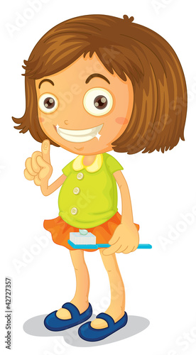 a girl brushing teeth
