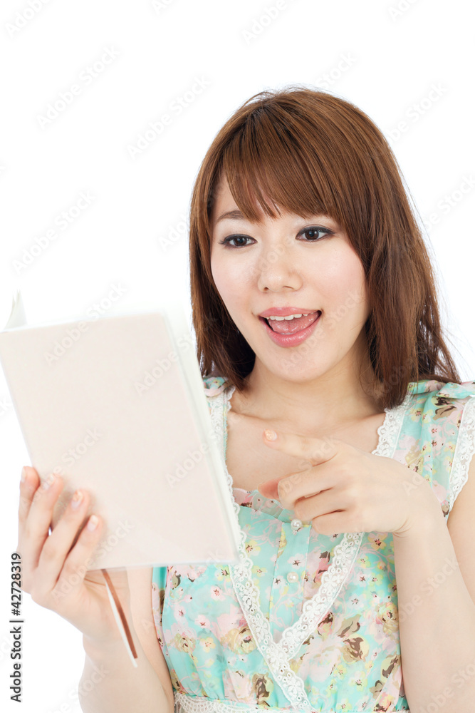 Beautiful young woman reading a book. Portrait of asian. Beautiful young woman reading a book. Portrait of asian.