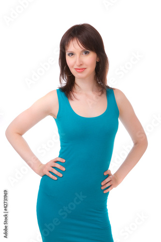 Beauty in a blue dress on a white background.