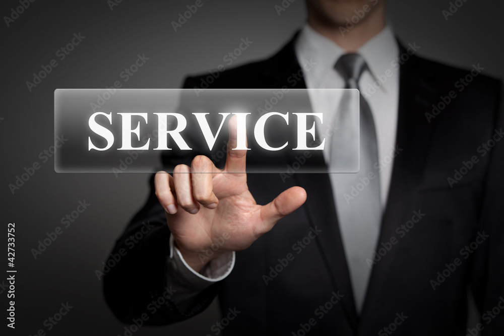 businessman touching virtual SERVICE button businessman touching virtual SERVICE button