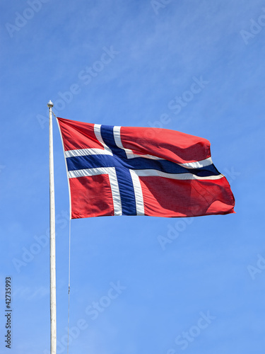 National Norwegian flag and a blue sky.