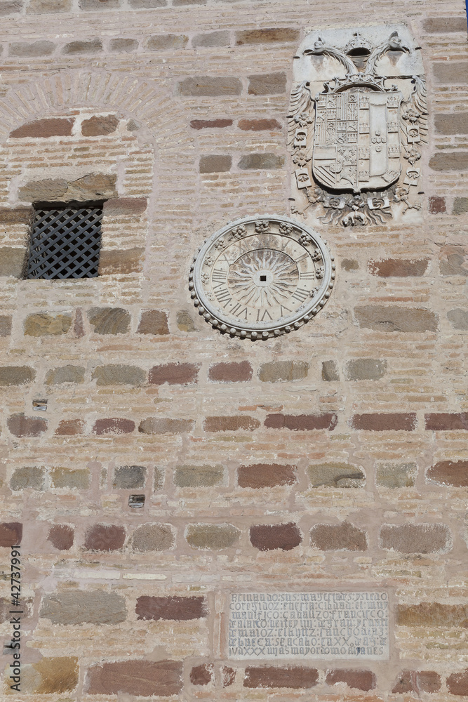 Escudo, reloj e inscripción en la Torre del Reloj, Andújar