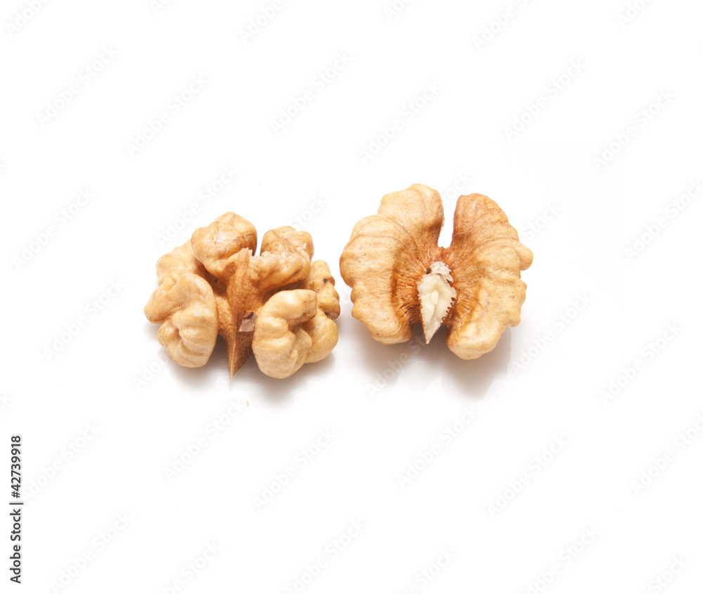 Crushed walnuts on white background Crushed walnuts on white background