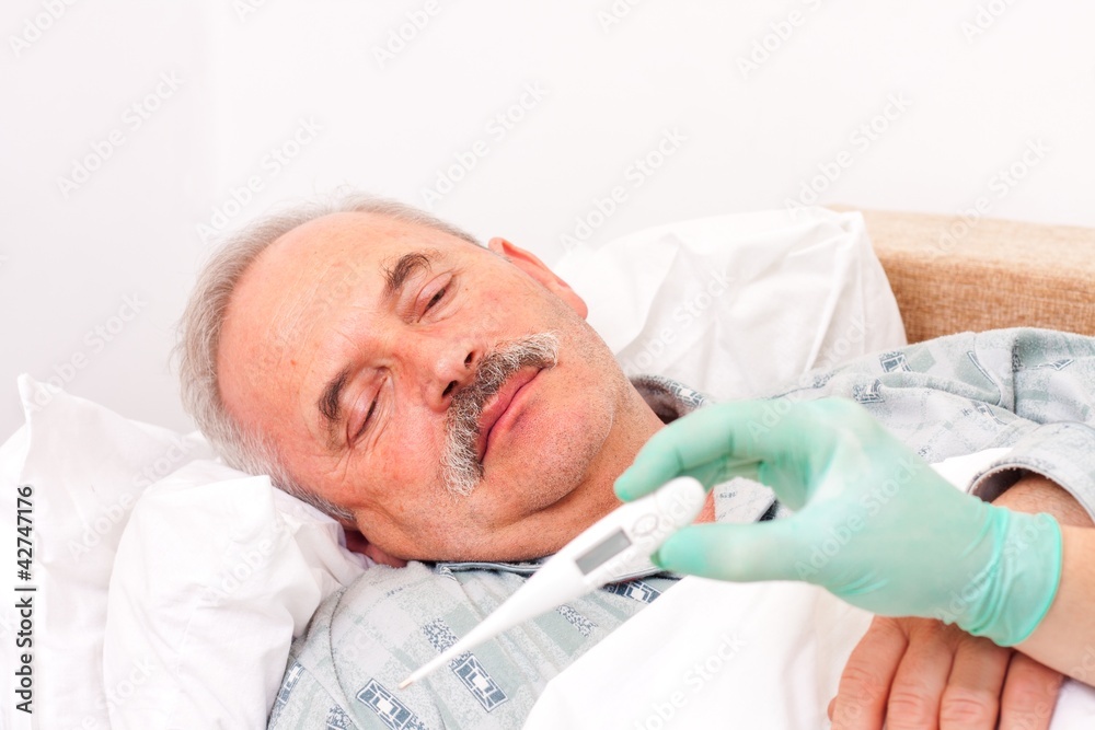 Senior man with fever Senior man with fever