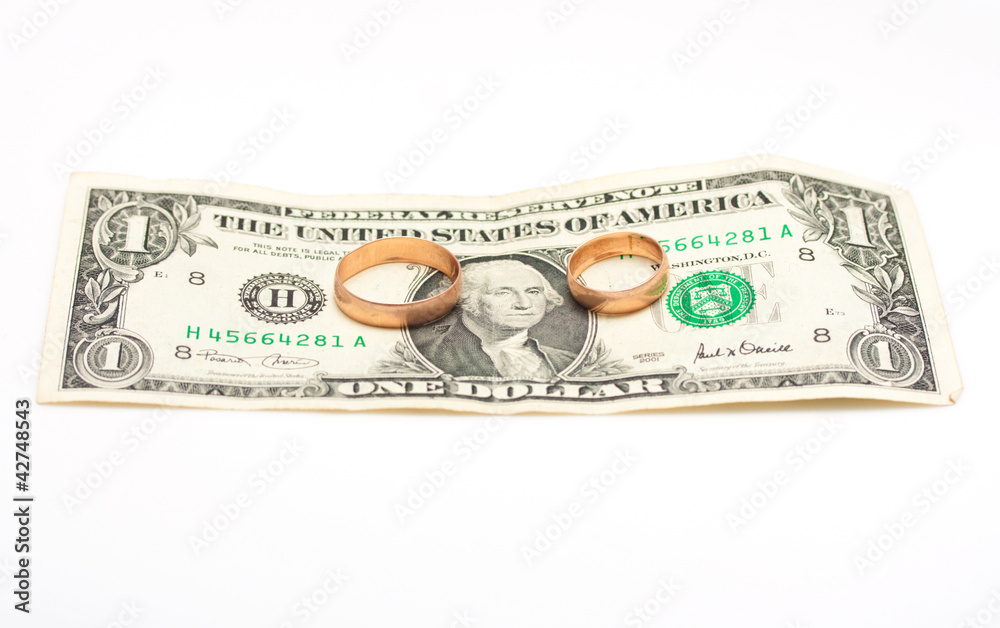 two golden rings on banknote 1 dollar