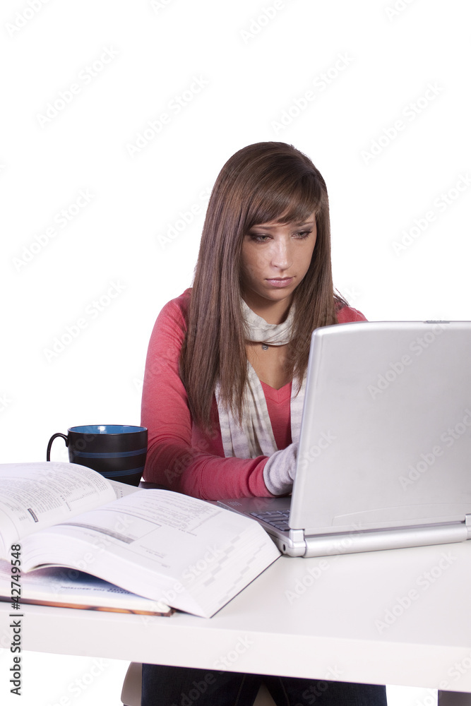 Young student studying for exams