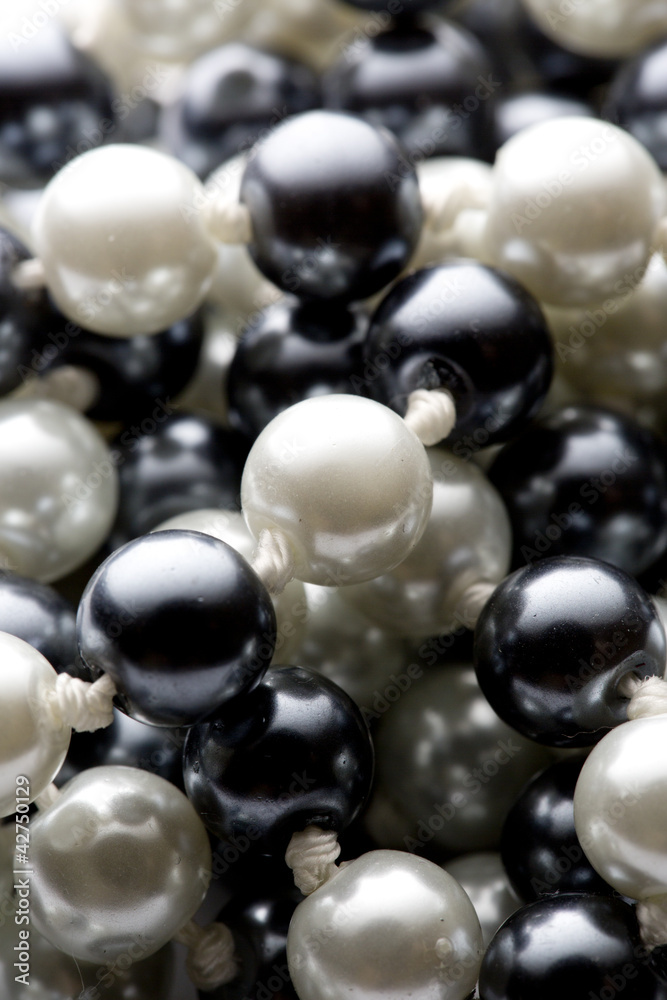 String of black and white pearls String of black and white pearls