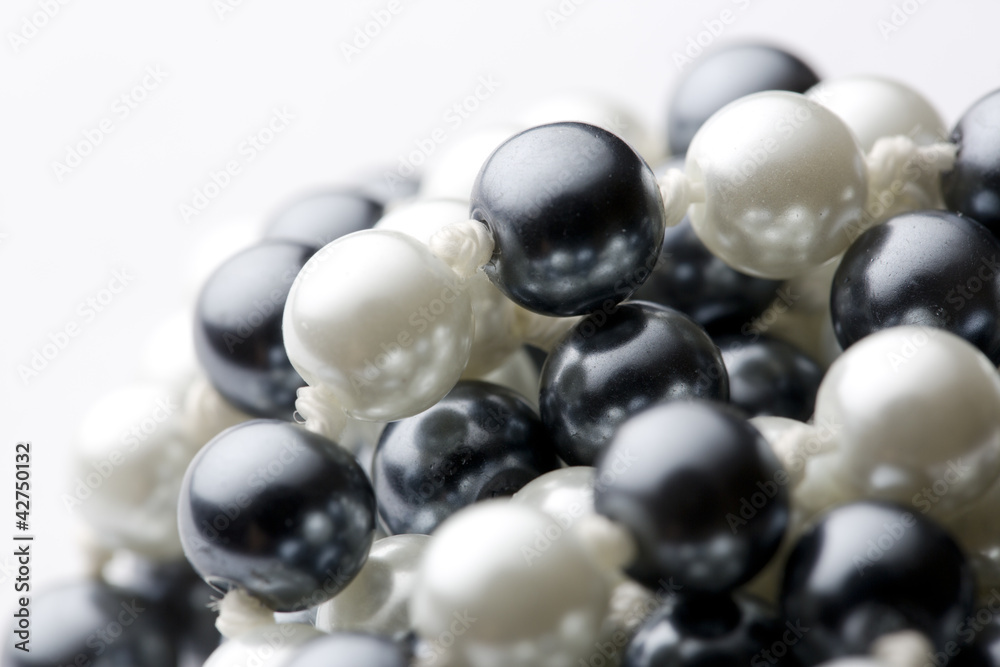 String of black and white pearls String of black and white pearls
