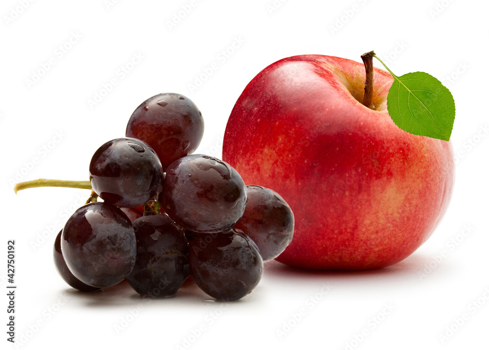 Red apple and grape on the white